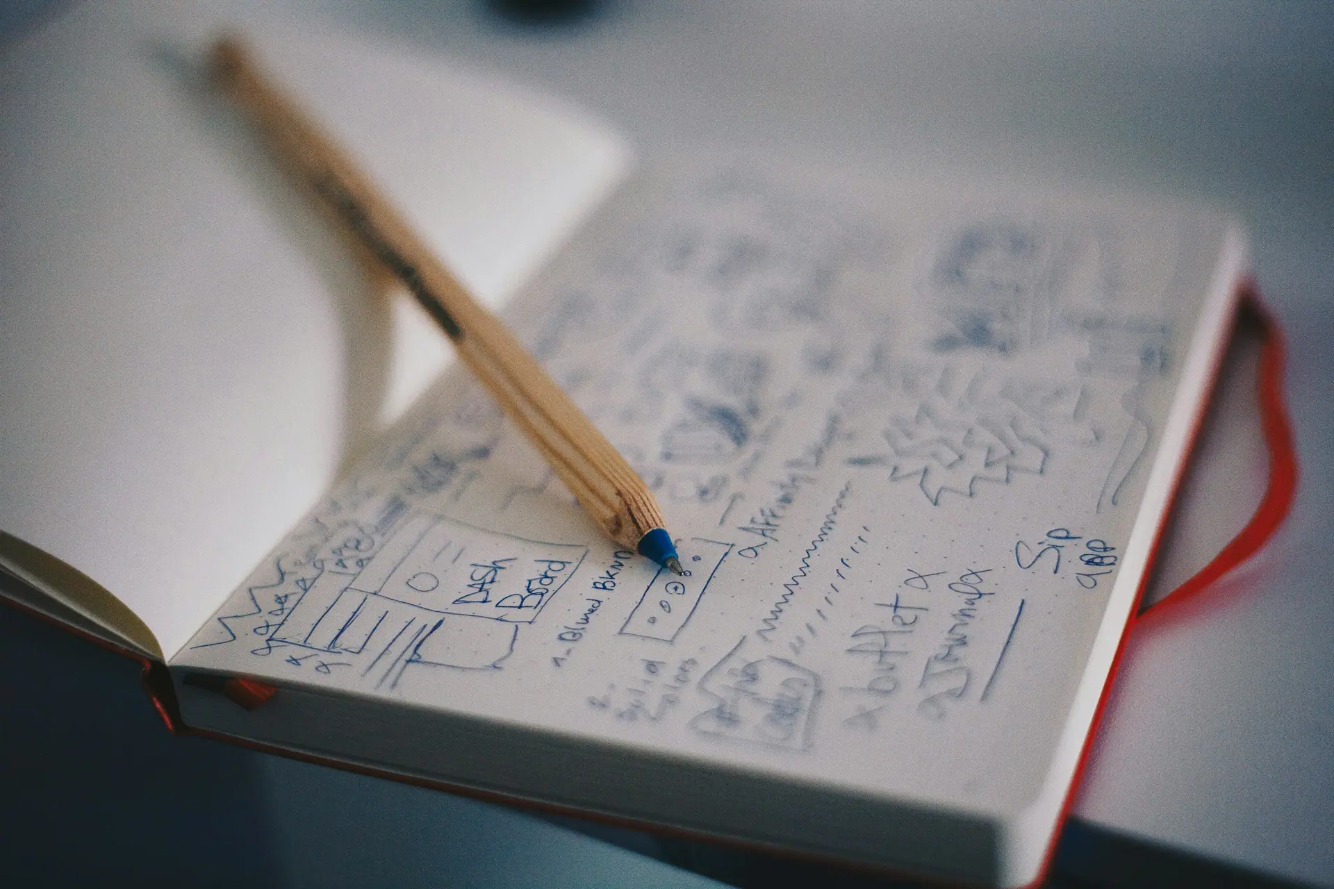 Design process sketches in a notebook, capturing early thinking.
